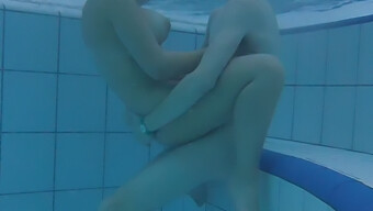 European Nudist Couple Engages In Sexual Activity In A Warm Pool